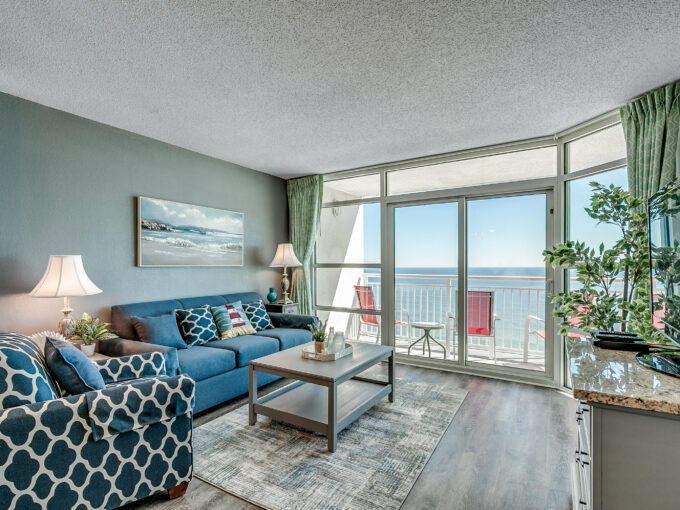 A living room with a couch and chair in it