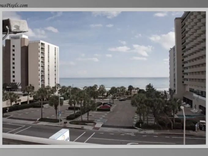 A view of the ocean from an apartment complex.